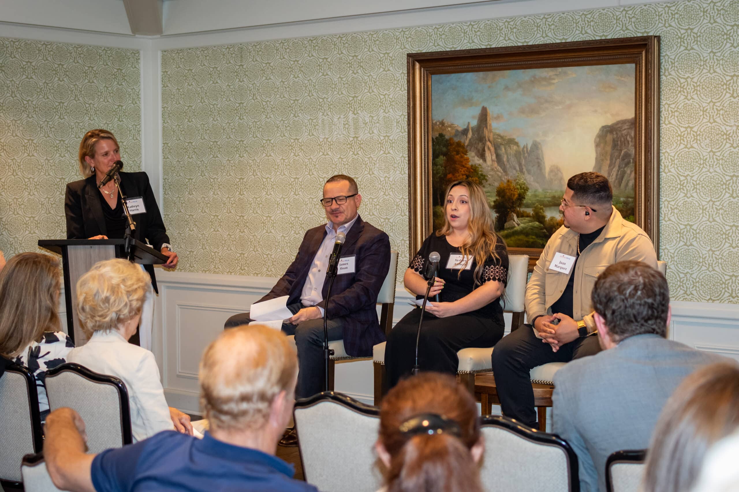 Sydney Atencio speaking on a panel of ActivateWork alumni at a fundraising event in 2025.