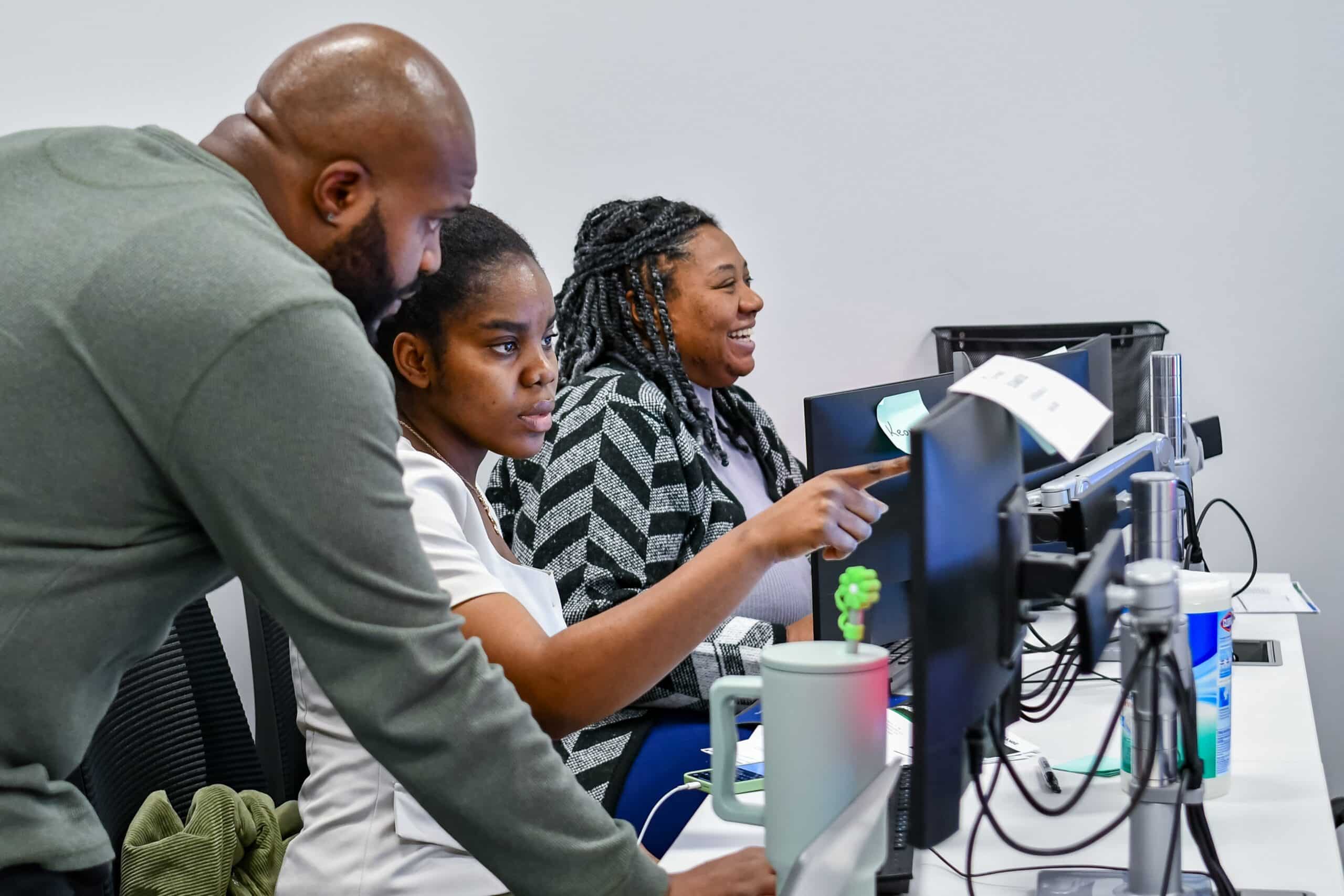 ActivateWork learners working together to responded to a simulated cyber attack during a training exercise