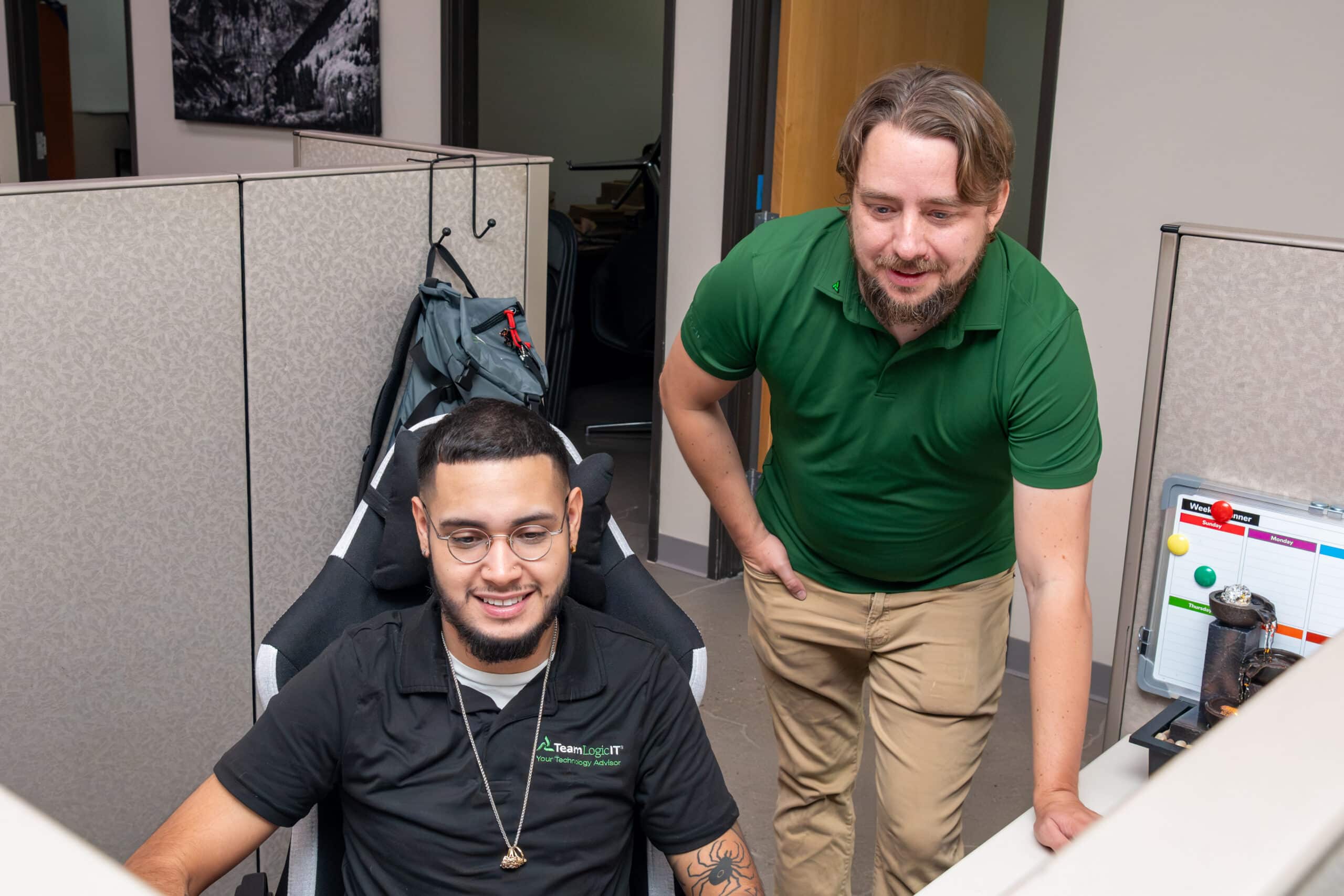 A TeamLogic IT leader working with an ActivateWork Apprentice